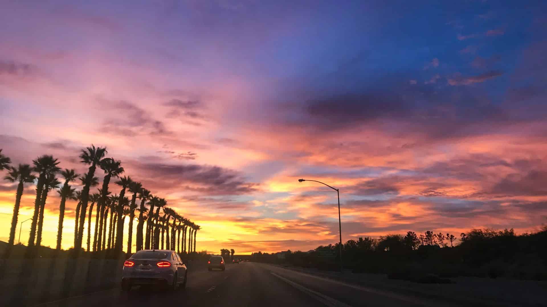 Vibrant sunset sky with colorful tones reflecting the calming atmosphere often associated with northern lights strain effects