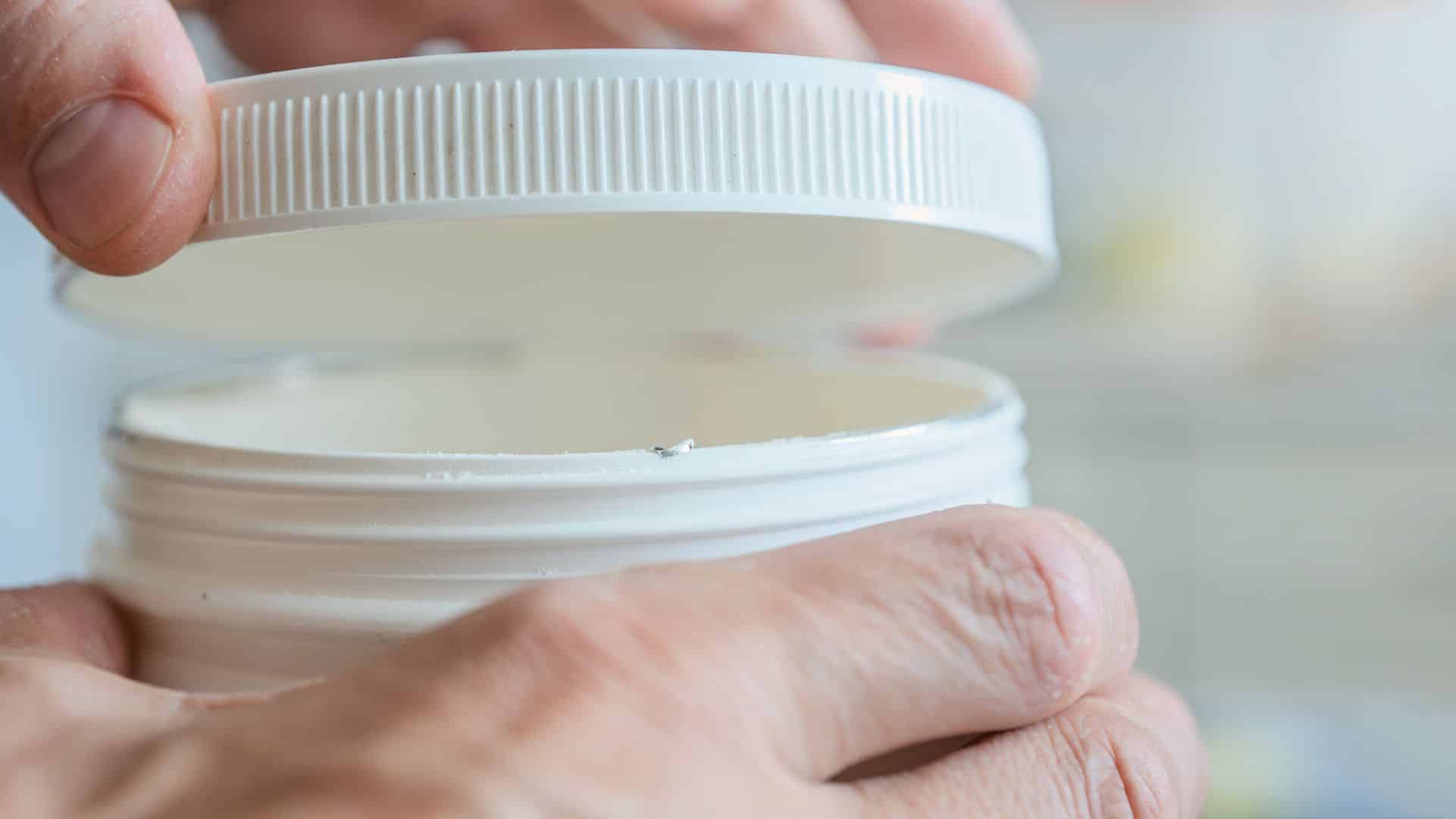 Close-up of an opened concentrate container, supporting educational content explaining what is live sauce.